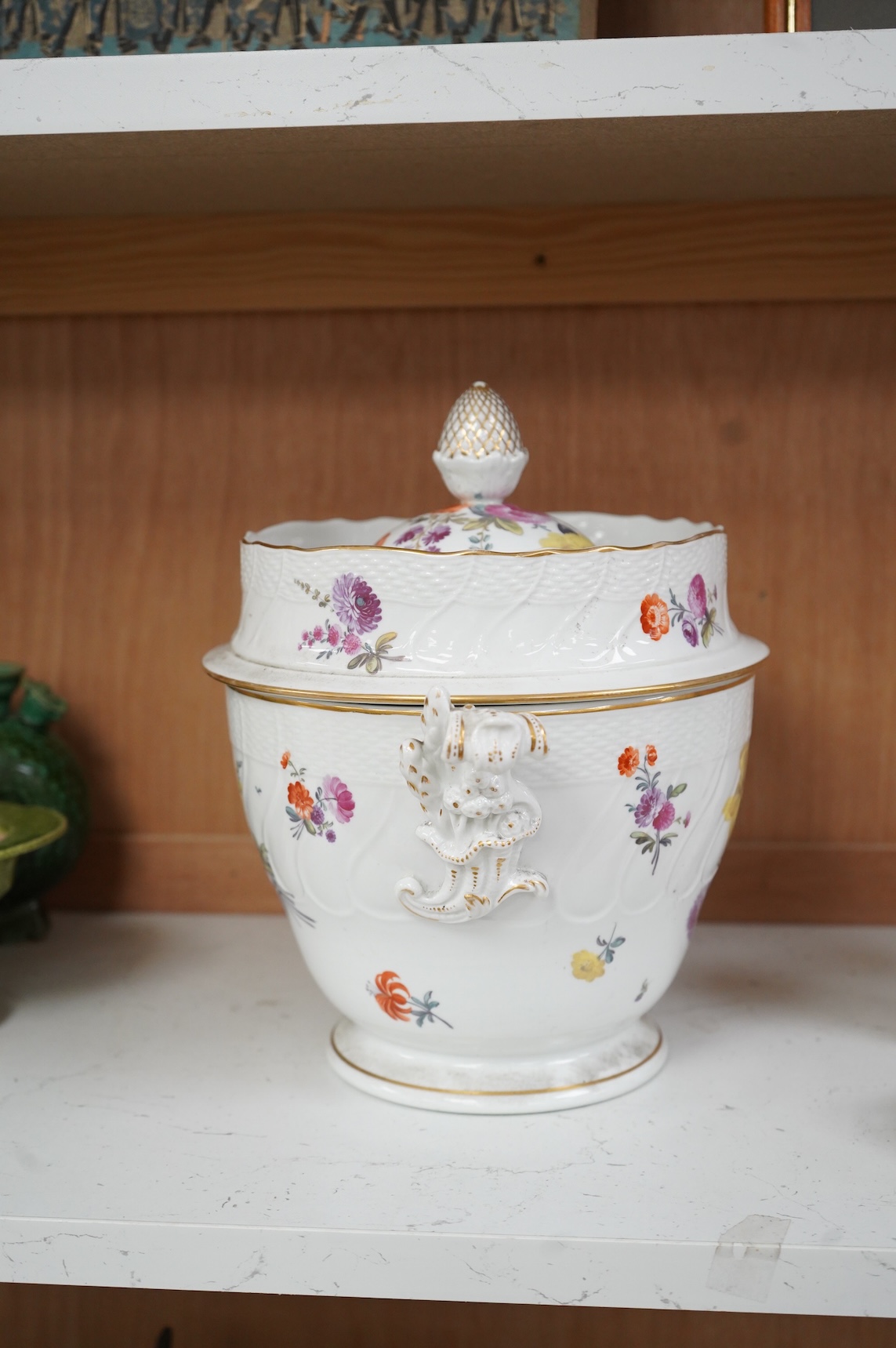 A late 18th/early 19th century English porcelain ice cream pail and cover, decorated with flowers, 27cm high